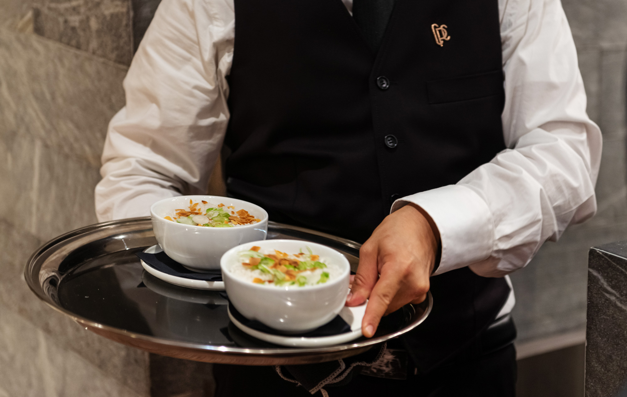 waiter at the club pierre charron bar and restaurant 